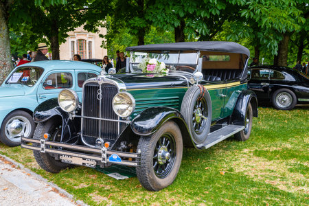 BADEN BADEN, GERMANY - JULY 2019: dark green STOEWER G15K cabrio roadster 1929, oldtimer meeting in Kurpark.のeditorial素材