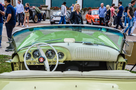 BADEN BADEN, GERMANY - JULY 2019: white leather interior of beige KAISER DARRIN cabrio roadster 1954, oldtimer meeting in Kurpark.のeditorial素材