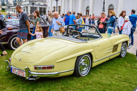 BADEN BADEN, GERMANY - JULY 2019: light yellow beige MERCEDES BENZ 300 SL cabrio roadster 198 1961,...