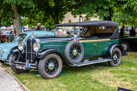 BADEN BADEN, GERMANY - JULY 2019: dark green STOEWER G15K cabrio roadster 1929, oldtimer meeting in Kurpark.のeditorial素材