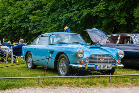 BADEN BADEN, GERMANY - JULY 2019: light blue ASTON MARTIN DB4 coupe 1958 1963, oldtimer meeting in...