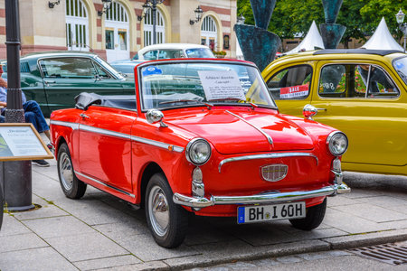 BADEN BADEN, GERMANY - JULY 2019: small red AUTOBIANCI BIANCHINA cabriolet cabrio, oldtimer meeting in Kurpark.のeditorial素材