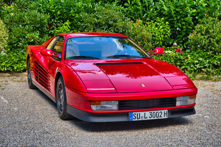 BADEN BADEN, GERMANY - JULY 2022: red FERRARI 328 GTS 1989 coupe, oldtimer meeting in Kurpark.