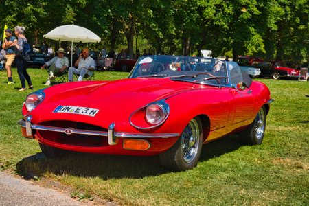 BADEN BADEN, GERMANY - JULY 2022: red 1961 Jaguar E-Type 3.8 Flat Floor Roadster cabrio, oldtimer...