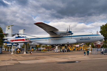SPEYER, GERMANY - OCTOBER 2022: white blue Antonov An-22 Antei Cock a heavy Soviet military transport aircraft Strategic airlifter and Mi-8 1967 Hip transport helicopter in the Technikmuseum Speyer.のeditorial素材