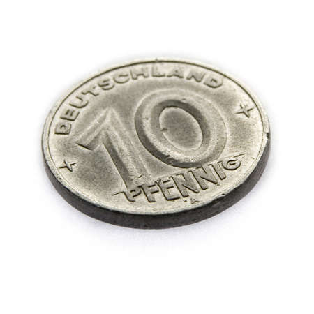 Photo of old coin over whiteの写真素材