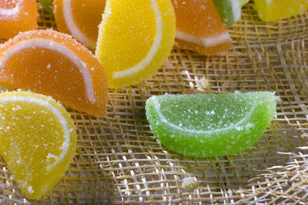 A photo of orange, green and yellow marmaladeの写真素材