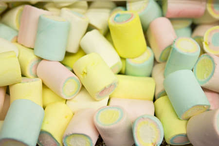 A photo of multi-colored marshmallow pileの写真素材