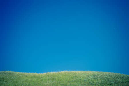 green hills and blue skyの写真素材