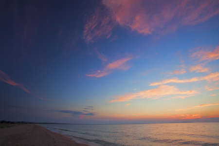 a photo of sunset on the beachの写真素材