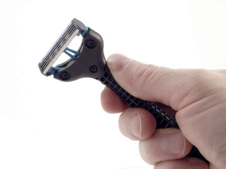 Mans Hand with Razor