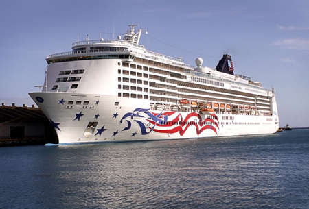 Cruise ship at pier on sunny afternoon, awaiting departure.の写真素材