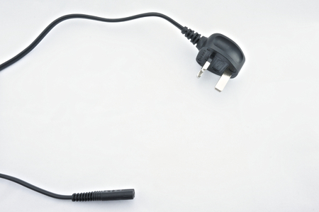 Black three-prong plug on white background  Line a standard and saveの写真素材