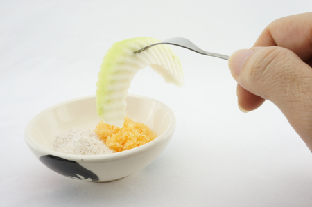 Eating sliced guava With plum and chilli for diet and healthy の写真素材