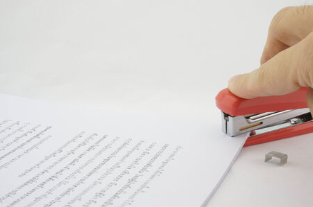 Stapler allows paper documents are organized and beautiful  Documents are scattered
