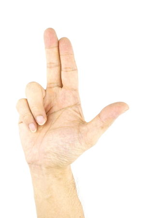 Hand of man make signal by gun isolated on white background.の写真素材
