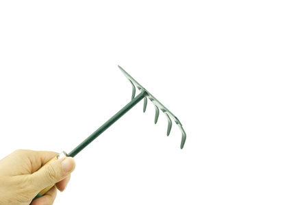 Man holding green harrow on bottom left isolated with white background.の写真素材