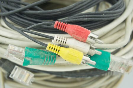 Stack of old and dirty several type of cable for computer.