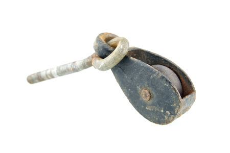 Close up old and dirty pulley put on the white background.の写真素材