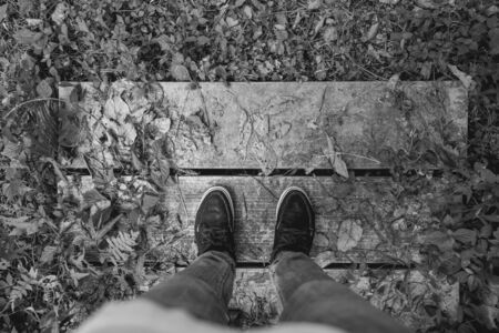 Looking down on feet , space for text. selective focus