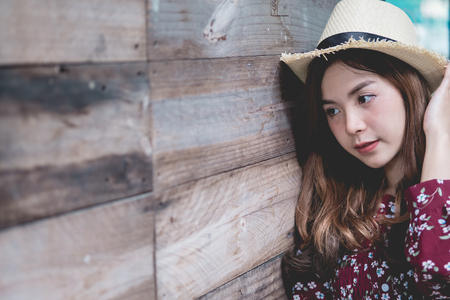 beautiful young asian girl have a happy time alone , vintage tone,  free happy woman enjoying nature, beauty girl outdoor, freedom concept,の写真素材