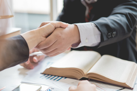 Client and lawyer have a sit down face to face meeting to discuss the legal options available
