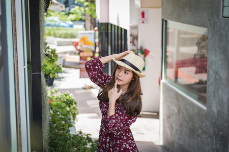 beautiful young asian girl have a happy time alone , vintage toneの写真素材