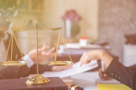 Client and lawyer having a meeting to discuss the legal options availableの写真素材