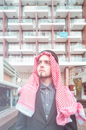 Arab business man standing the office, business conceptの写真素材