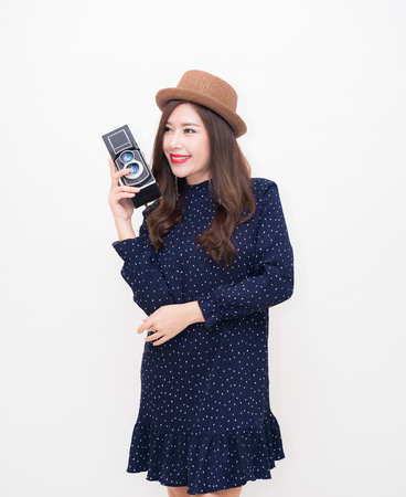 Beautiful young Asian woman with vintage style on white backgroundの写真素材