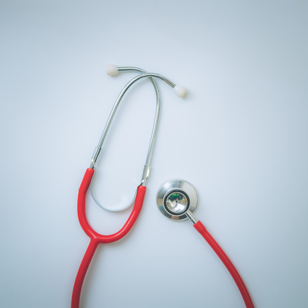close up stethoscope on white background, world health day concept, process vintage tone