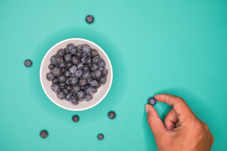 blueberries fruit in bowl, Colorful back ground, Healthy conceptの写真素材
