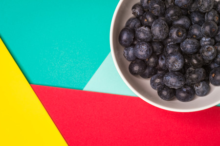 blueberries fruit in bowl, Colorful back ground, Healthy conceptの写真素材