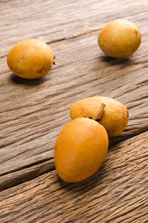 Sapodilla on rustic wooden table