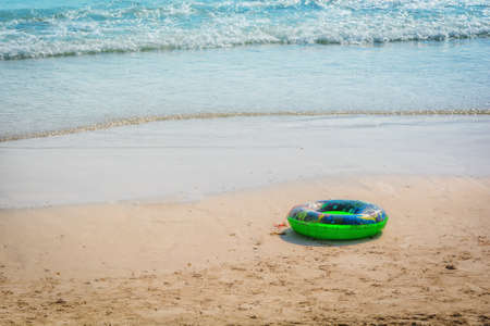 swimming tubes on the beachの写真素材