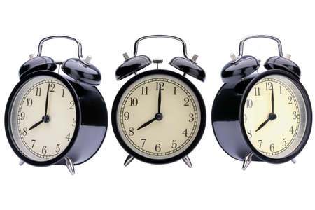 Eight o'clock on Black alarm clock on white background with clipping path in different angles