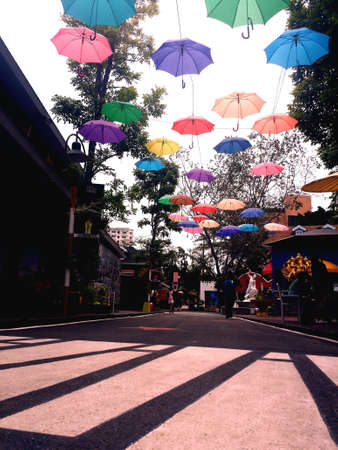 Walking street with umbrellasの素材