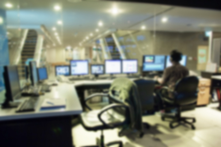 blurred image against computer studio