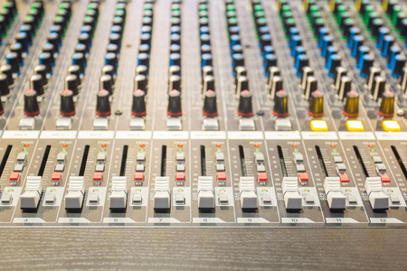the controls of an Audio Mixing Consoleの写真素材