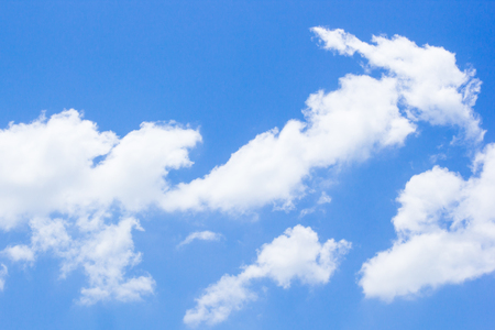 Sky background with white cloudsの写真素材