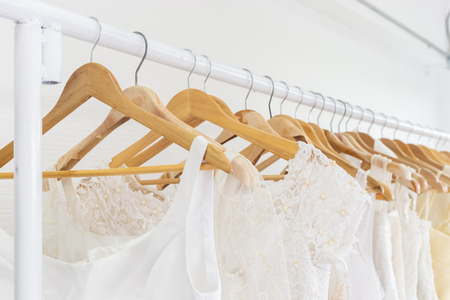 wedding dresses on a hanger.の写真素材