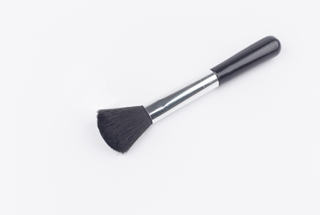 black cleaning brush on white backgroundの写真素材