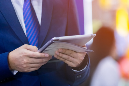 Businessman with tablet searching for data, Communication technology Concept.の写真素材