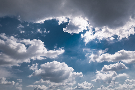 Sky background with white cloudsの写真素材