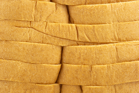 Slices of white bread texture background.