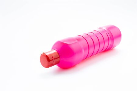 Bathroom cleaning liquid pink bottle on white backgroundの写真素材