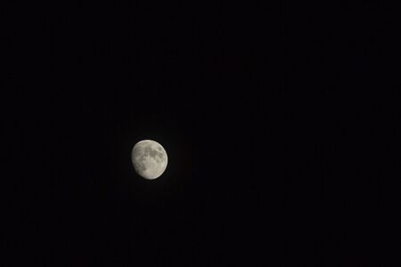 Moon In the dark black background Photos night with copy space.