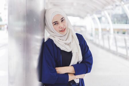 Asian beautiful muslim woman standing and smiling looking camera, Portrait concept.