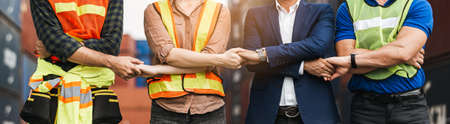 Teamwork engineer technician and foreman shaking hands work successful, connection partnership successful concept.の写真素材