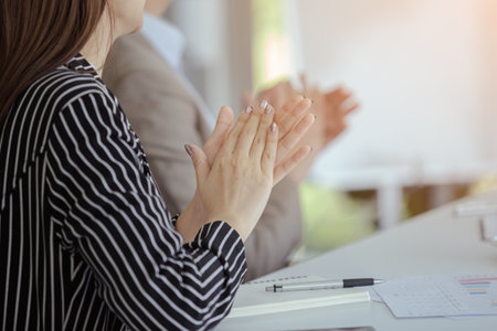 close up focus on hands applause, congratulate successful meeting, business teamwork partner...